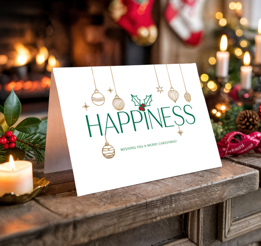 Christmas card with "Happiness" text on a festive background with candles and decorations.
