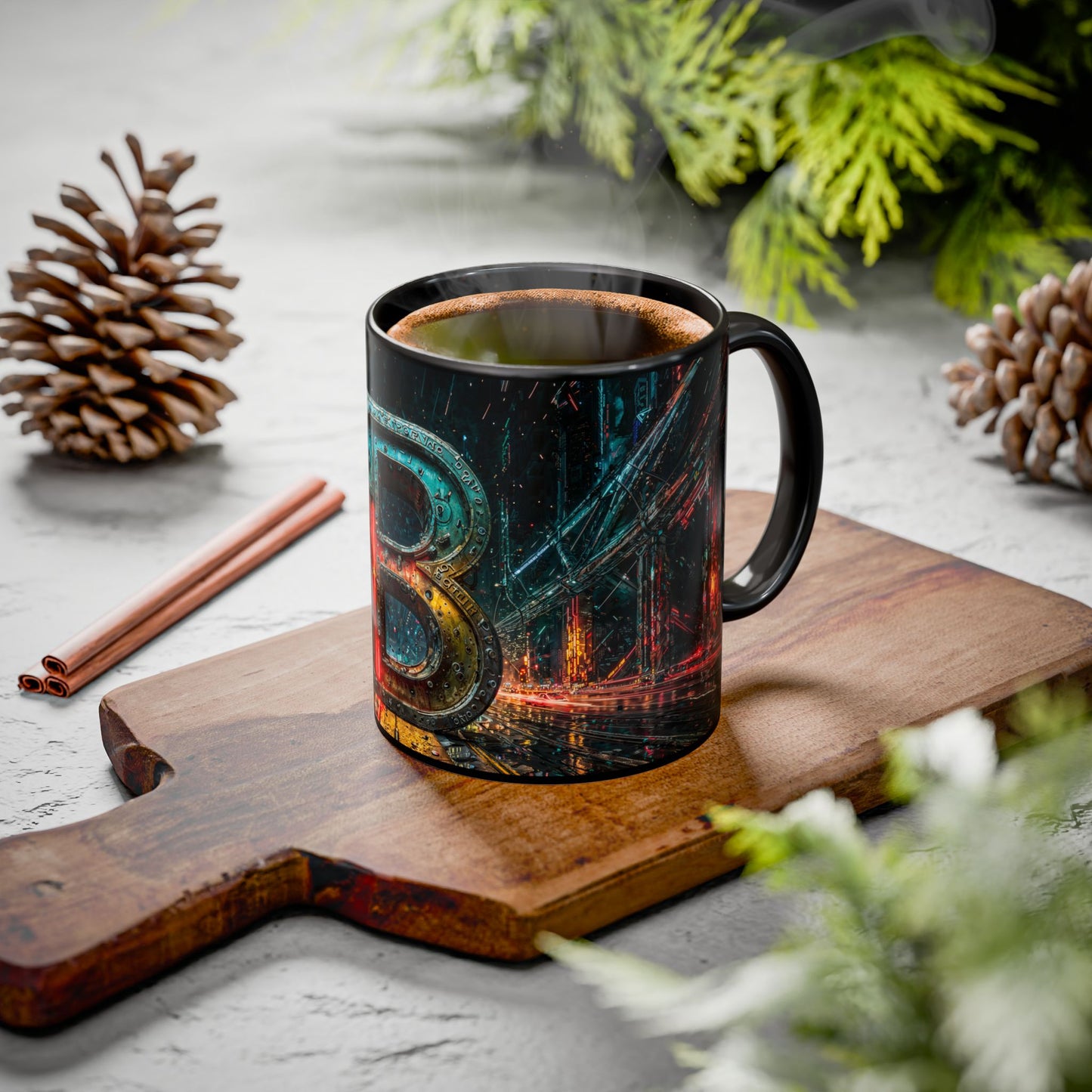Black mug with colorful design on a wooden cutting board with cinnamon sticks and pine cones.