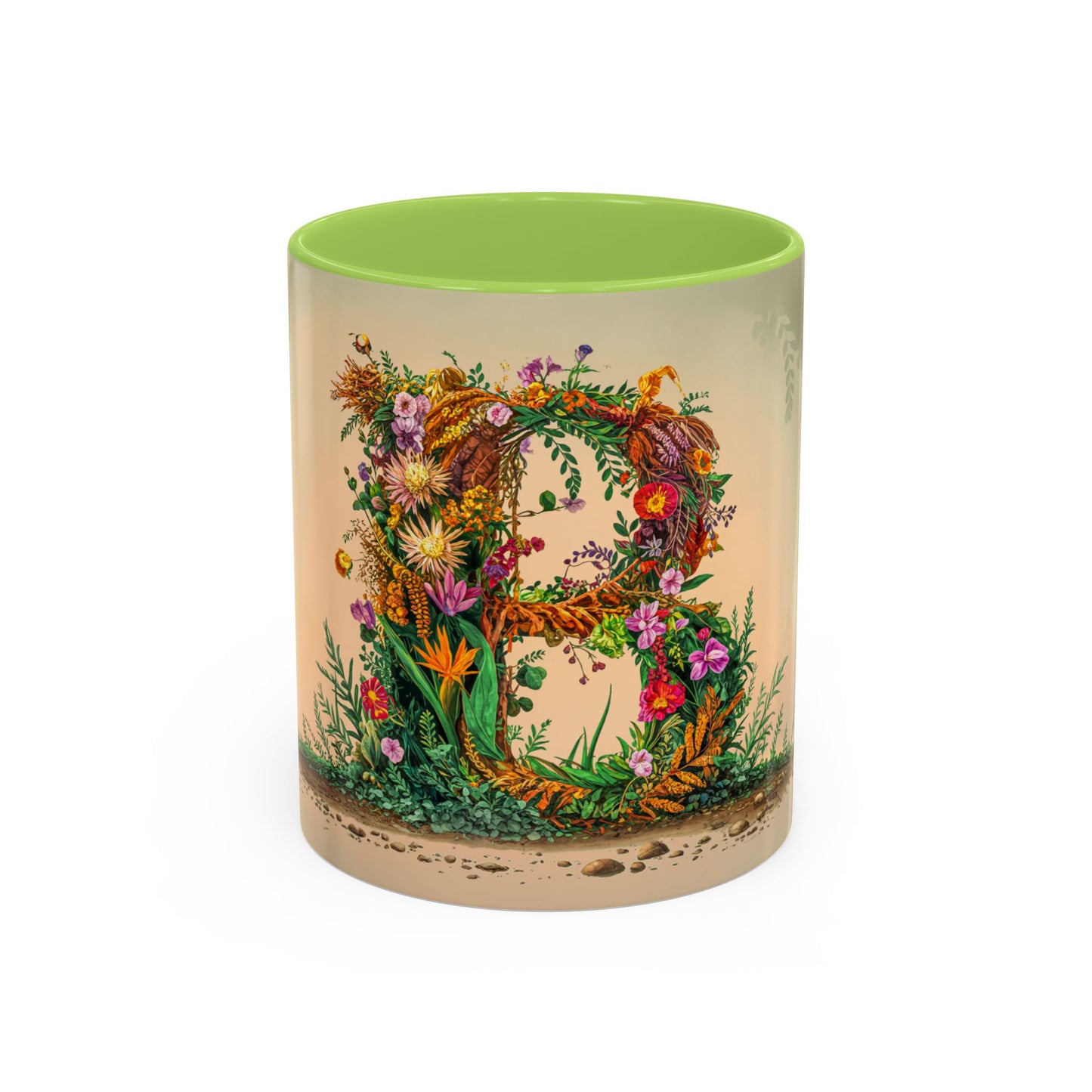 Decorative mug with floral design and green interior on a white background