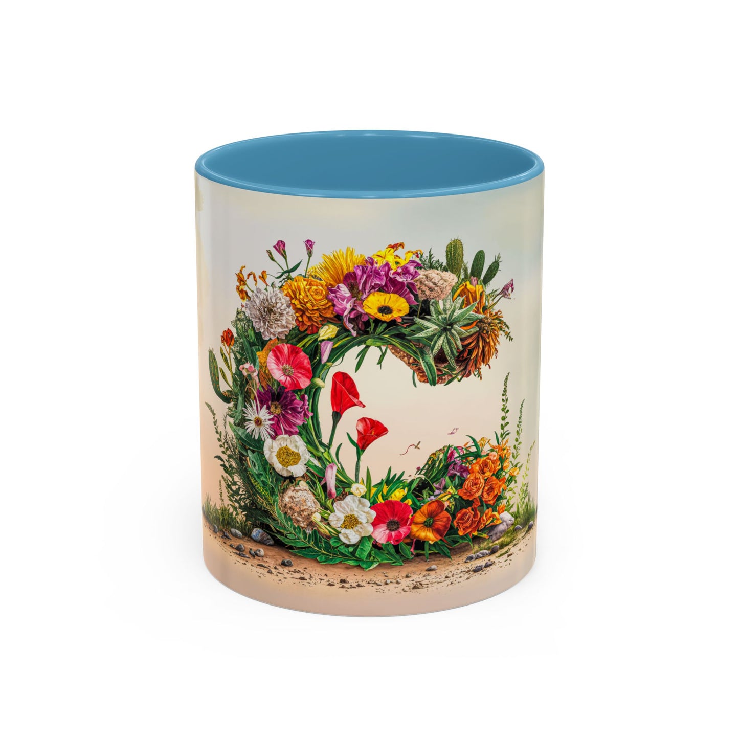 Mug with floral design and blue interior on a white background