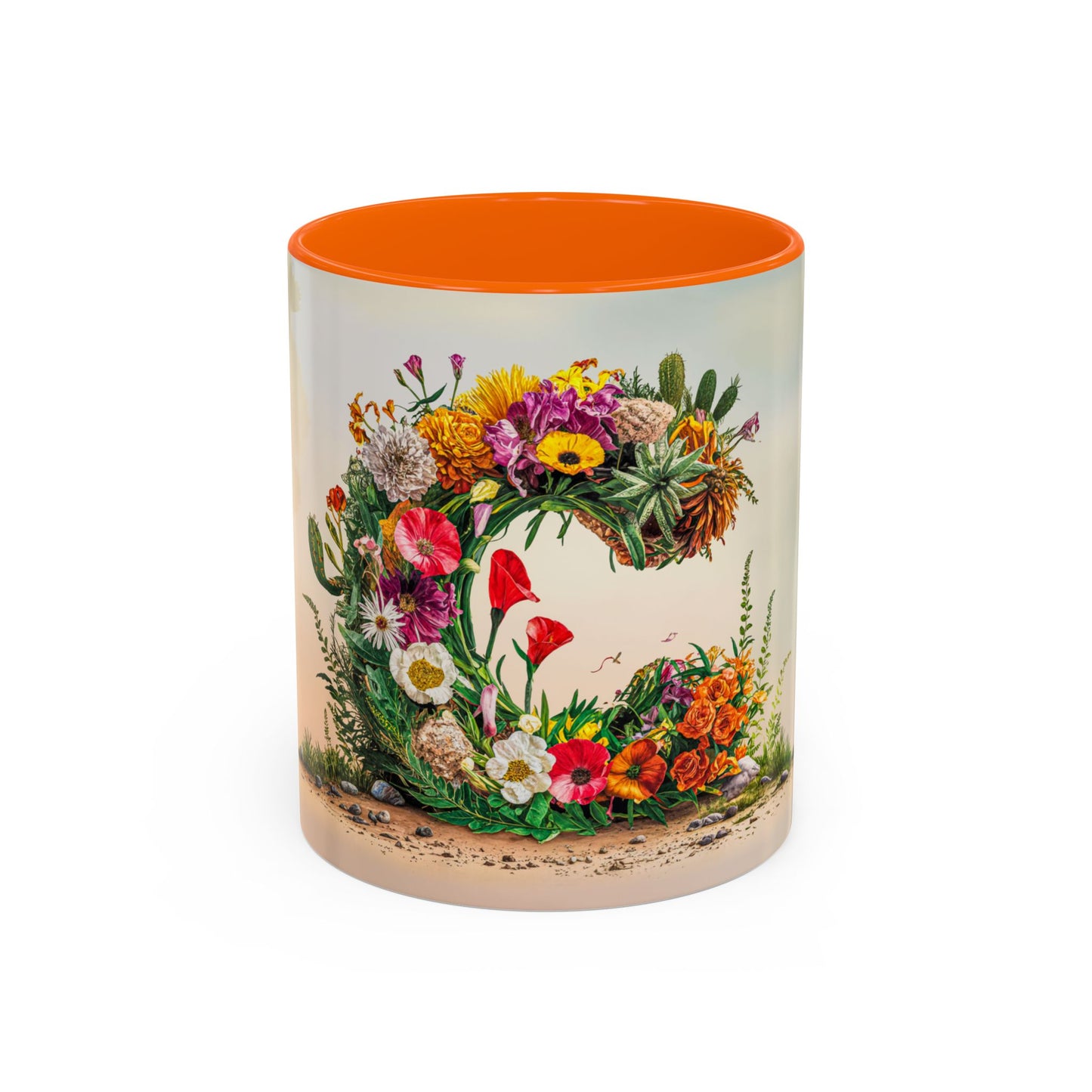 Mug with floral design and orange interior on a white background