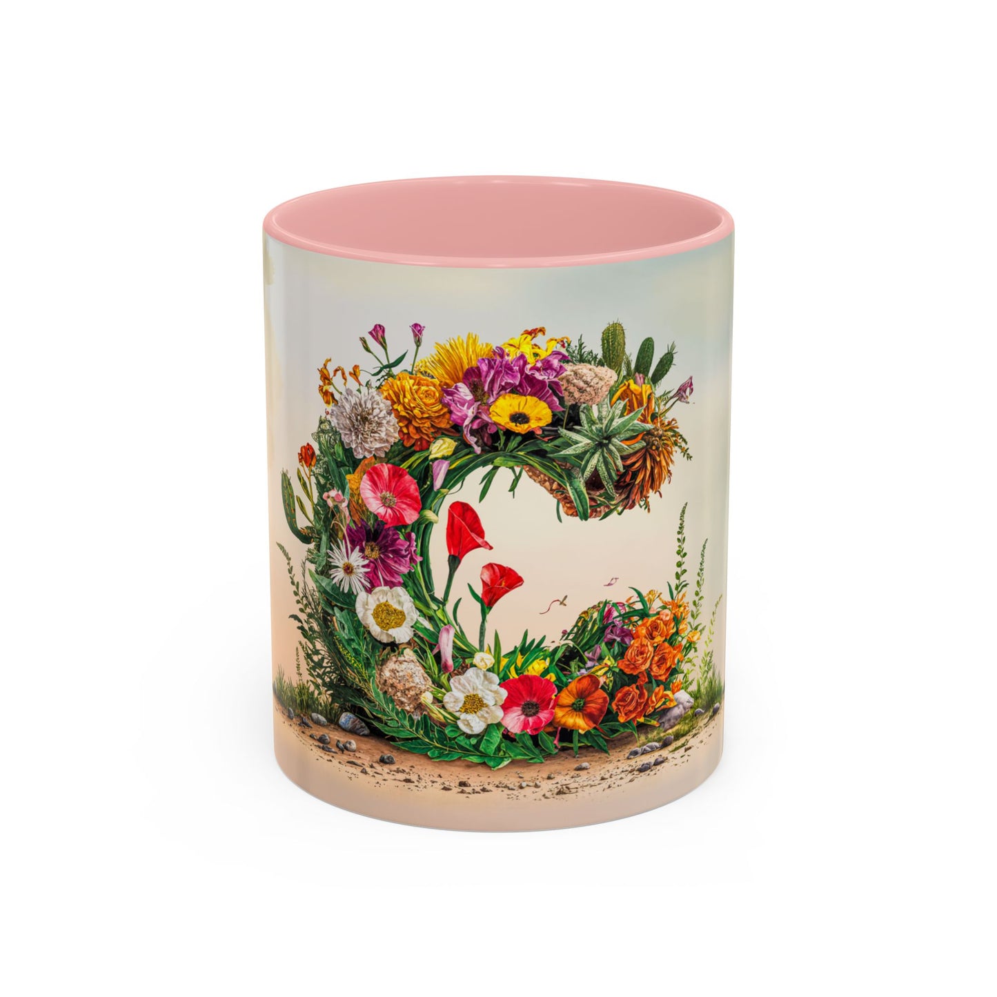 Mug with floral design and pink interior on a white background