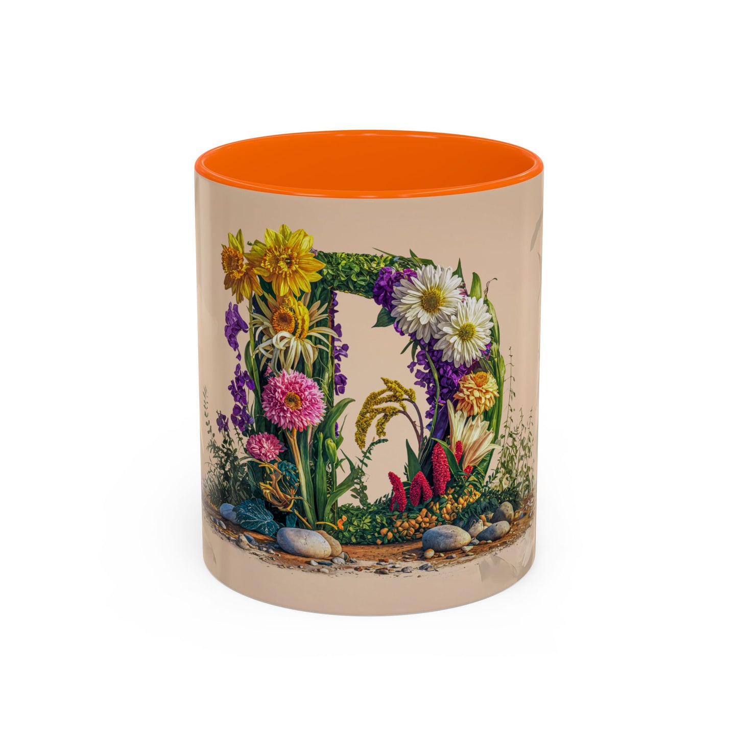 Mug with floral design and orange interior on a white background