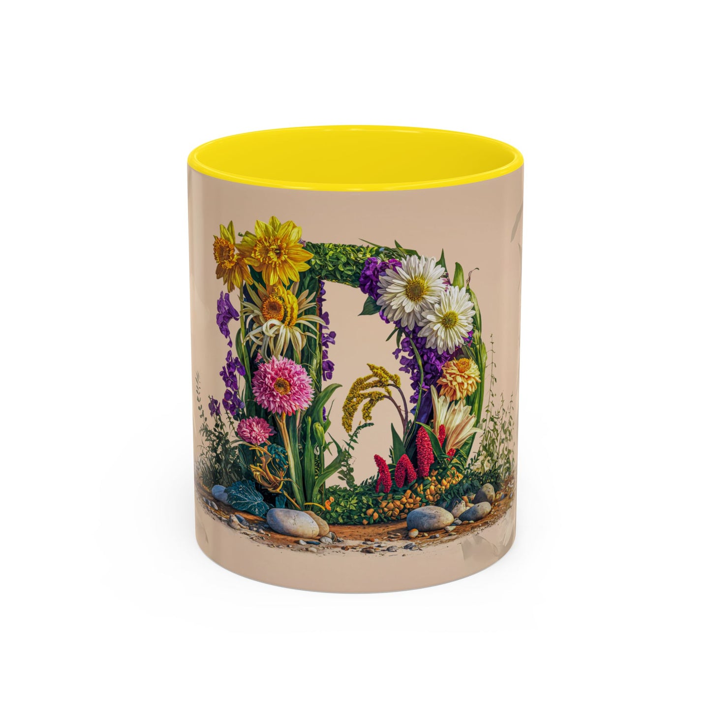 Mug with floral design and yellow interior on a white background