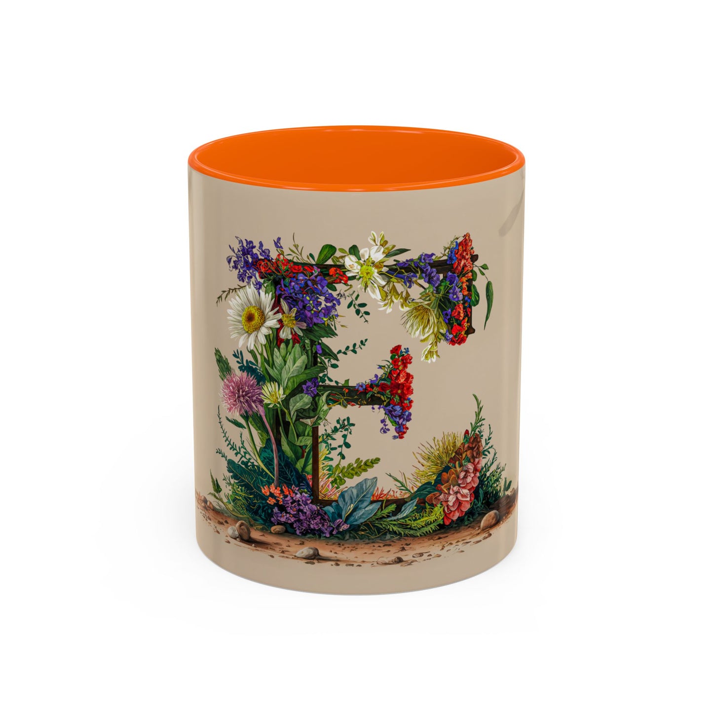 Mug with a floral design and orange interior and handle