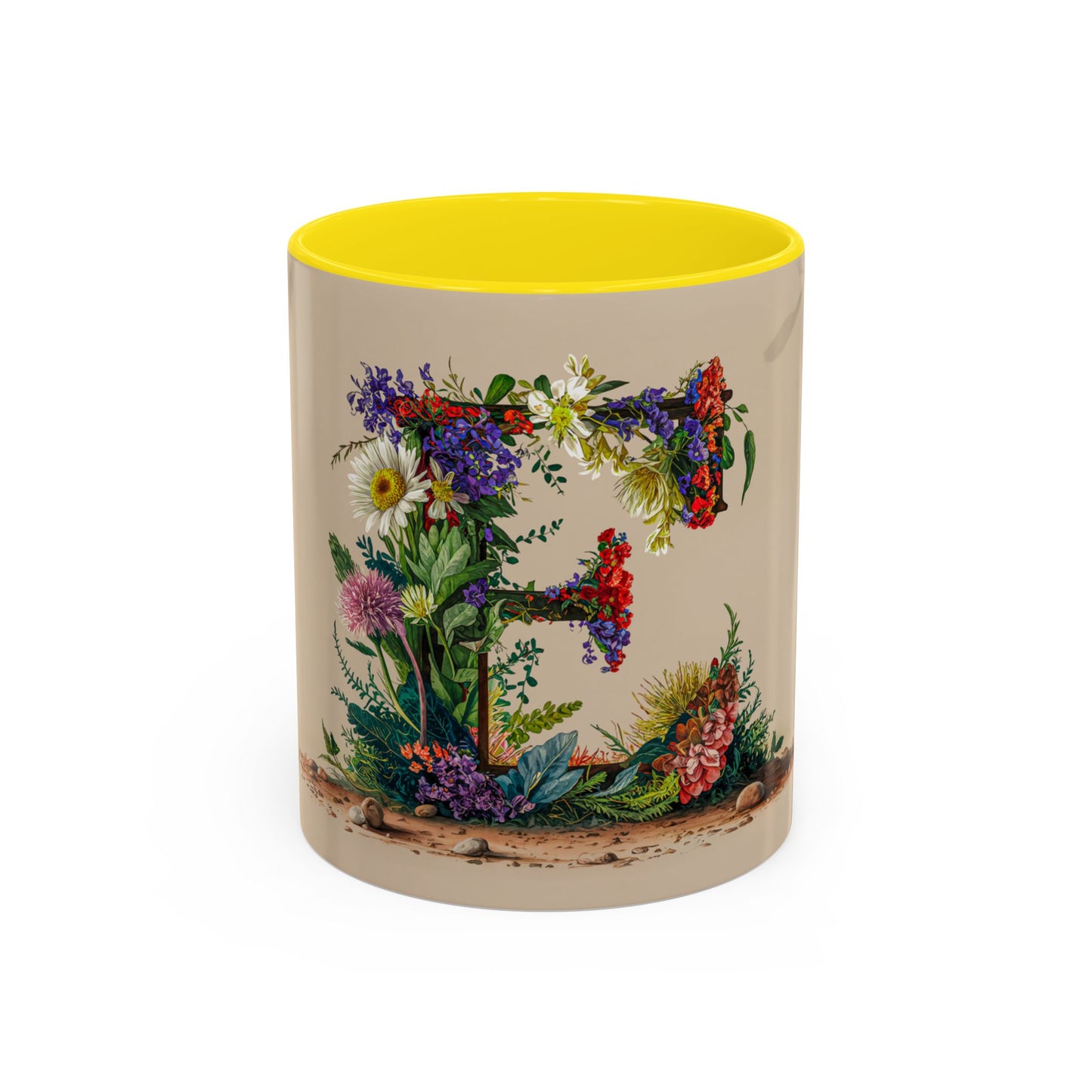 Mug with floral design and yellow interior on a white background