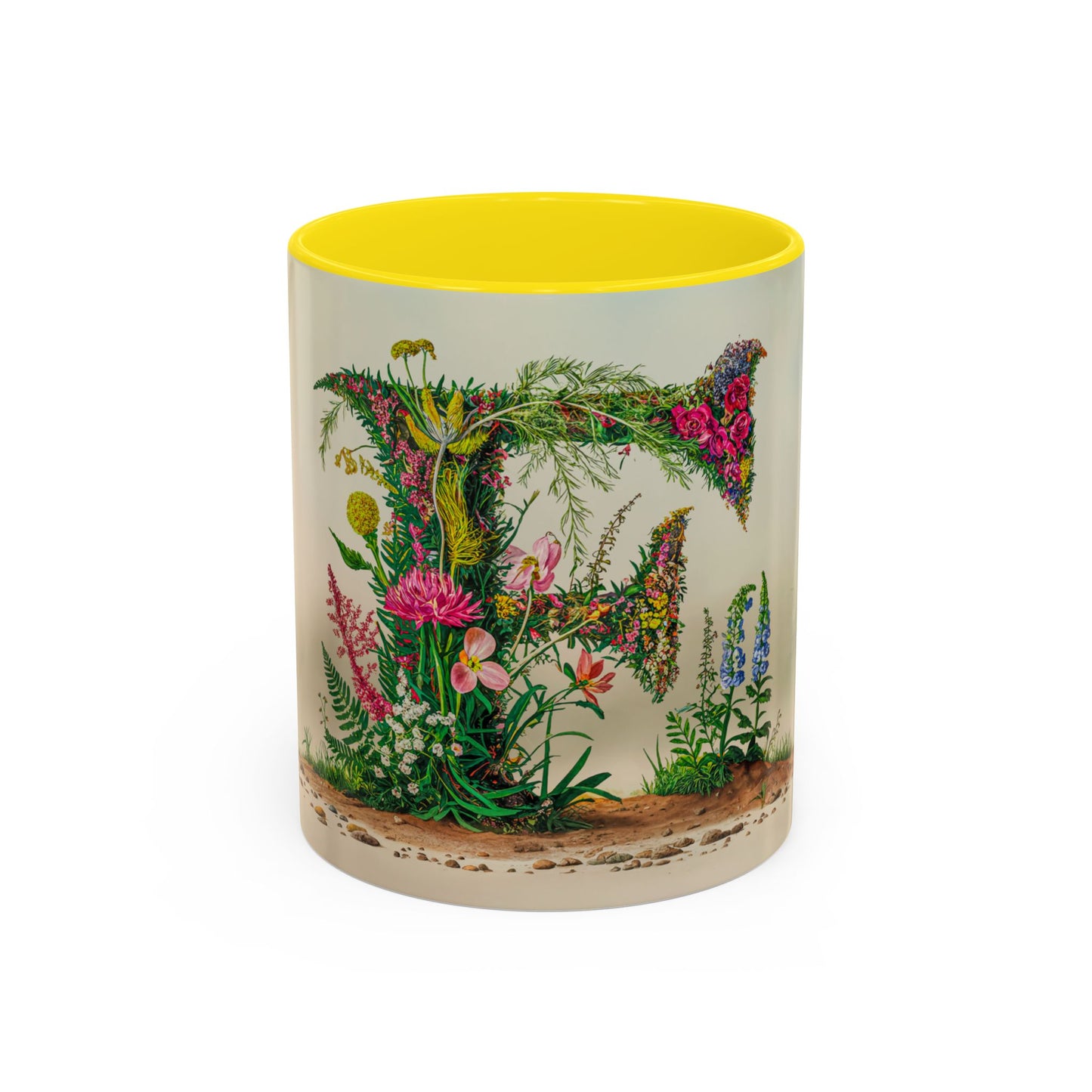 Mug with floral design and yellow interior on a white background