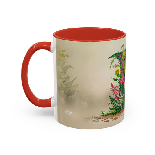 Mug with red interior and handle, featuring a nature-themed design on the exterior.