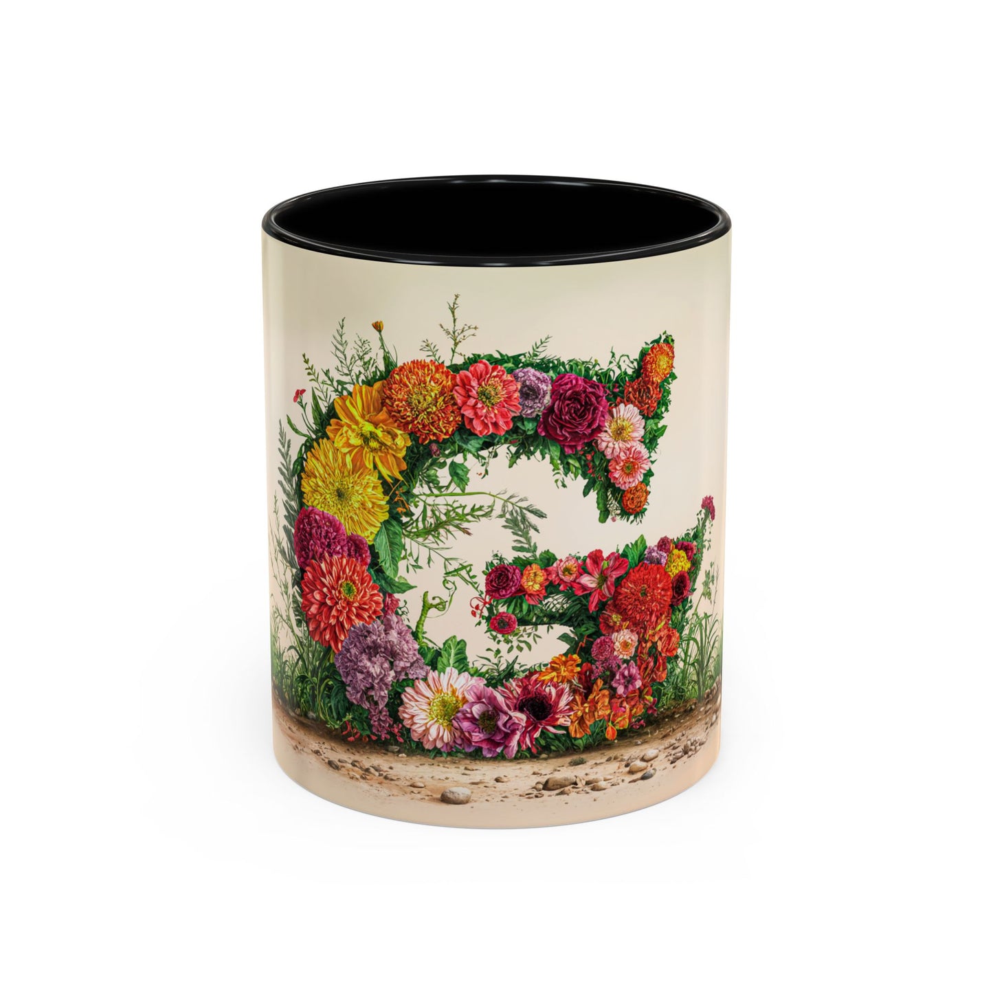 Mug with floral design and letter 'G' on a white background