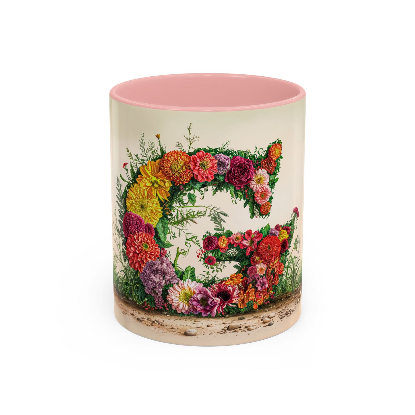 Mug with floral design and pink interior on a white background