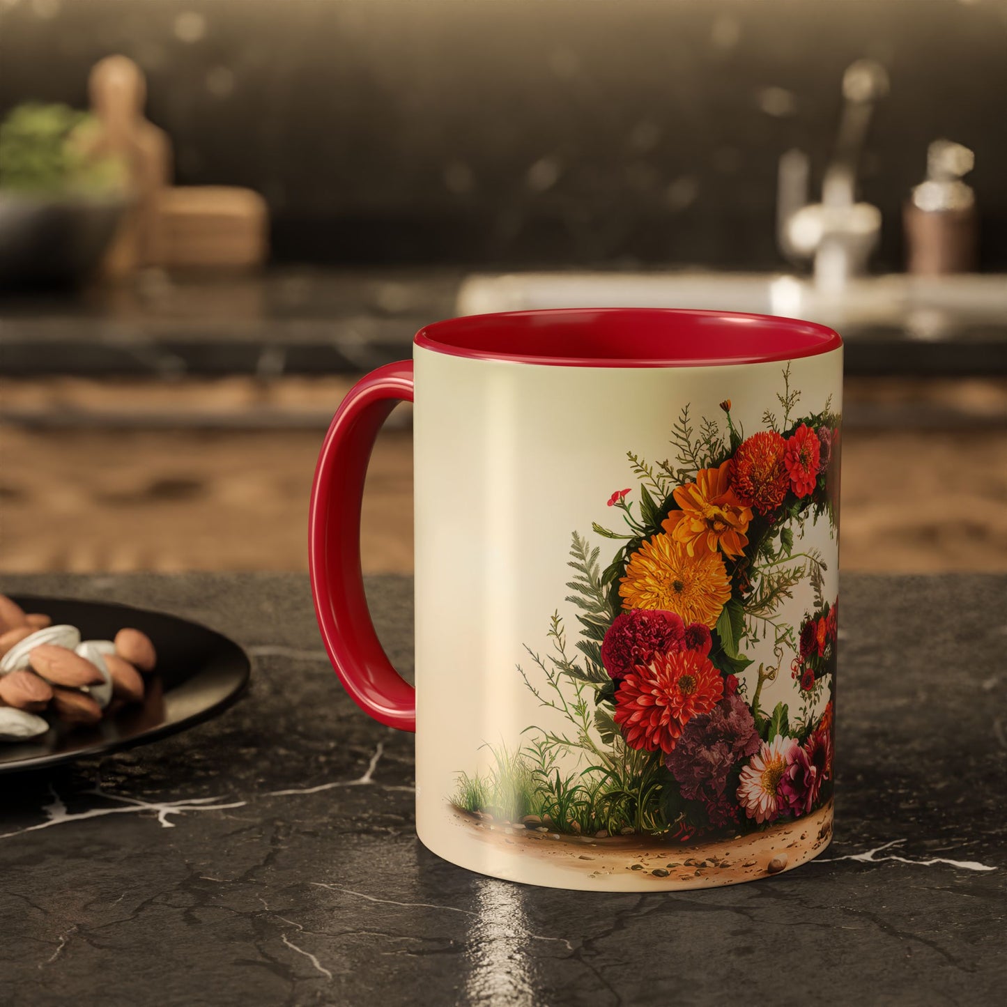 Mug with floral design and red interior on a kitchen counter