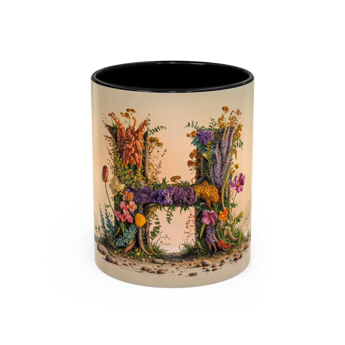 Mug with floral design spelling 'H' on a beige background