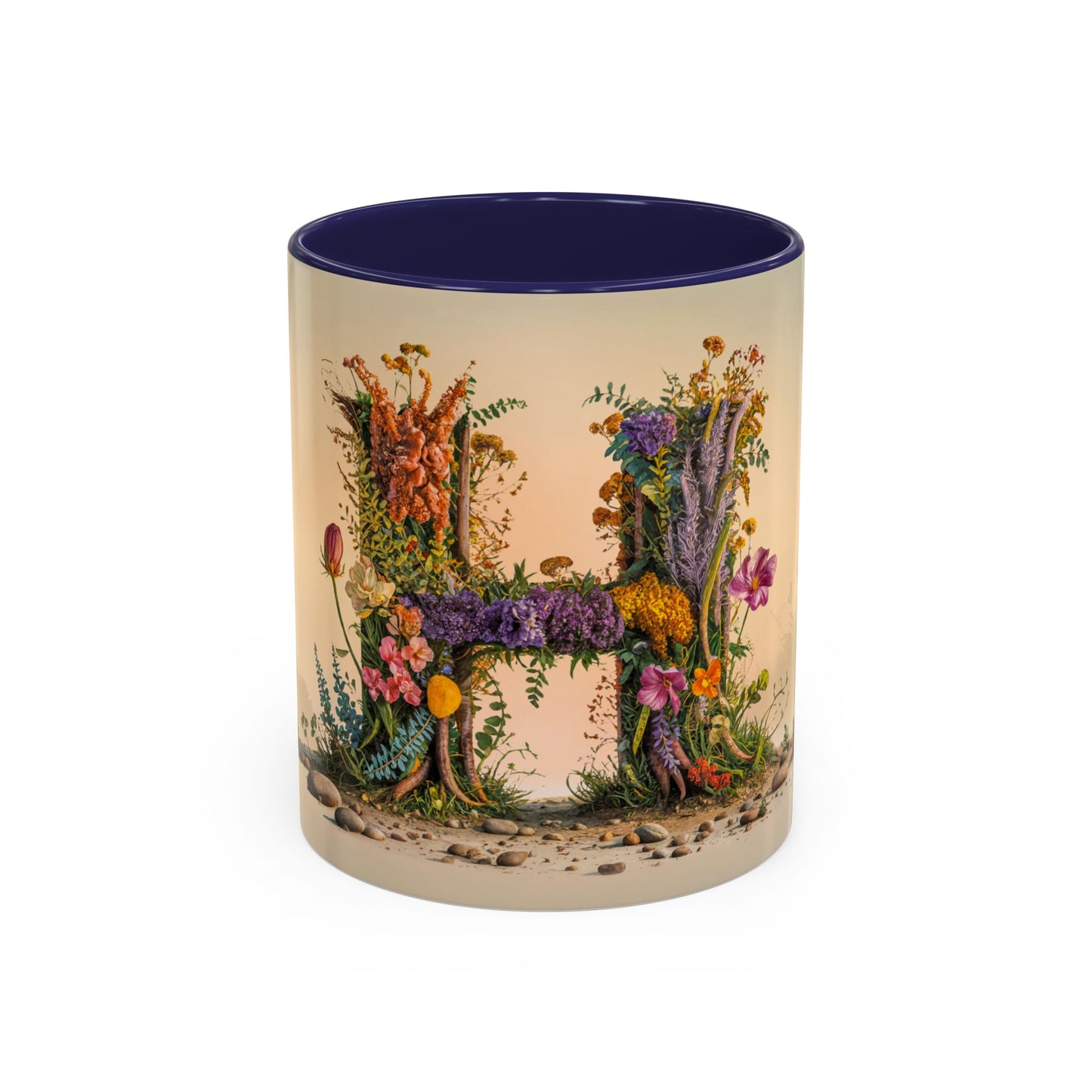 Mug with floral design spelling 'H' on a beige background