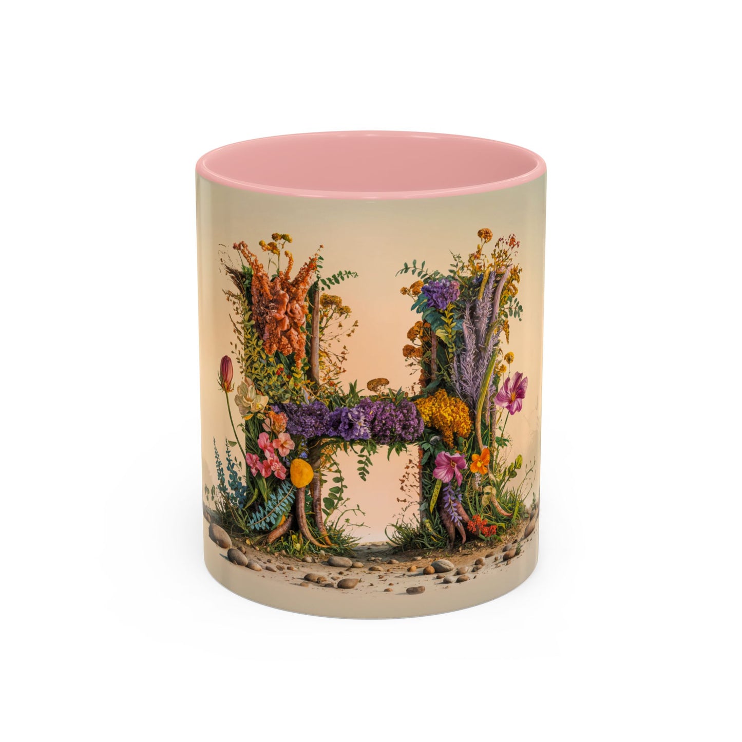 Mug with floral design and letter 'H' on a white background
