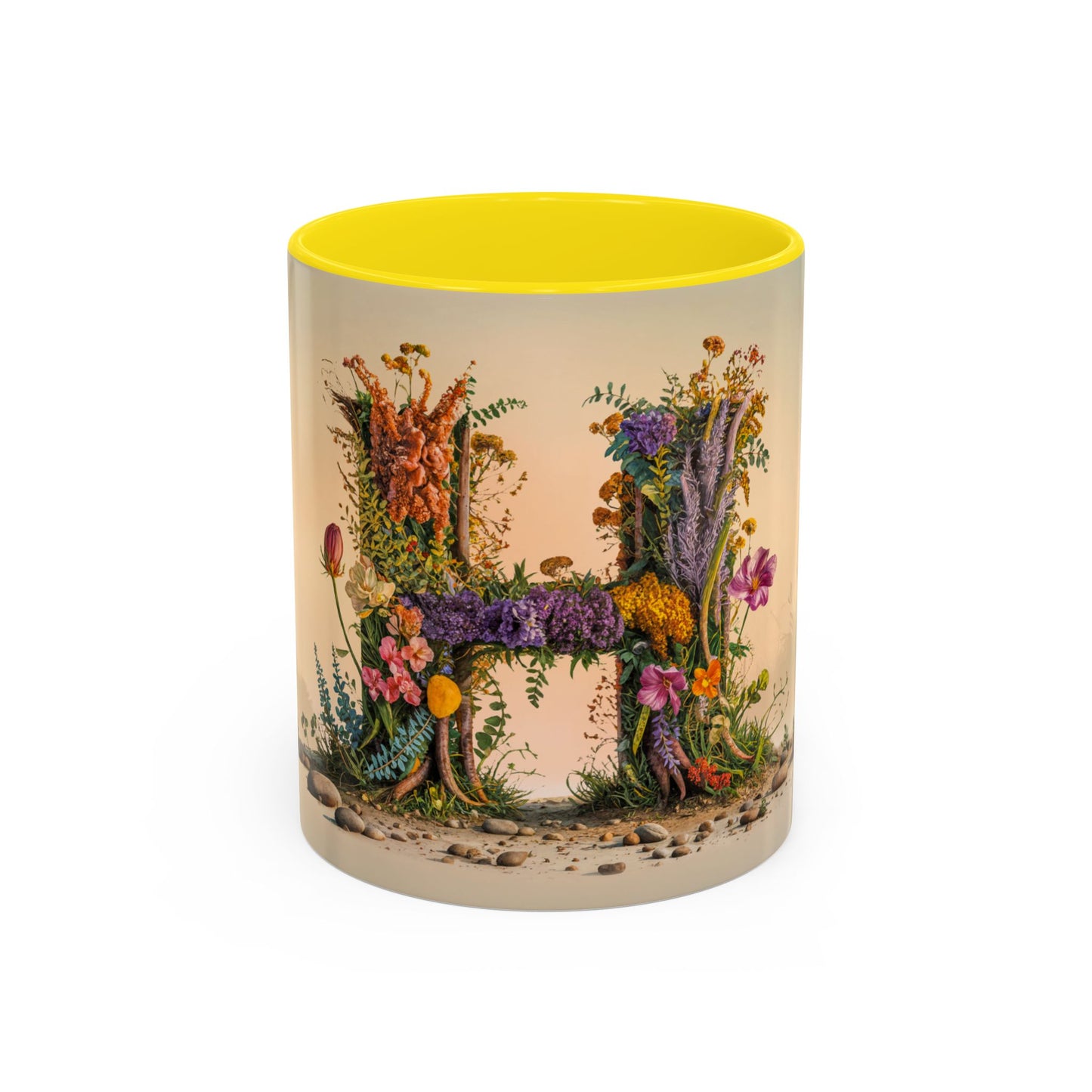 Mug with floral design and yellow interior on a white background