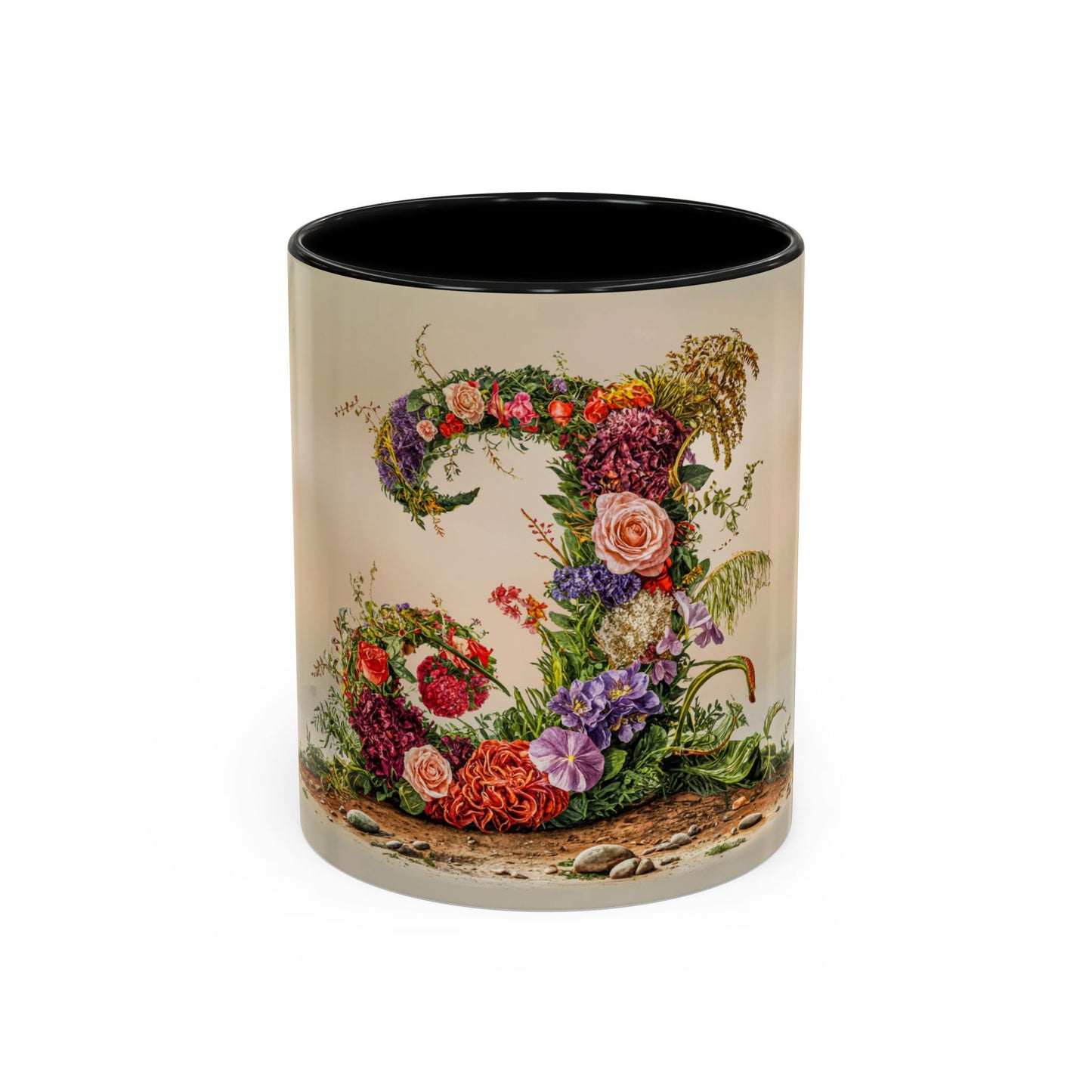 Mug with floral design and letter J on a white background