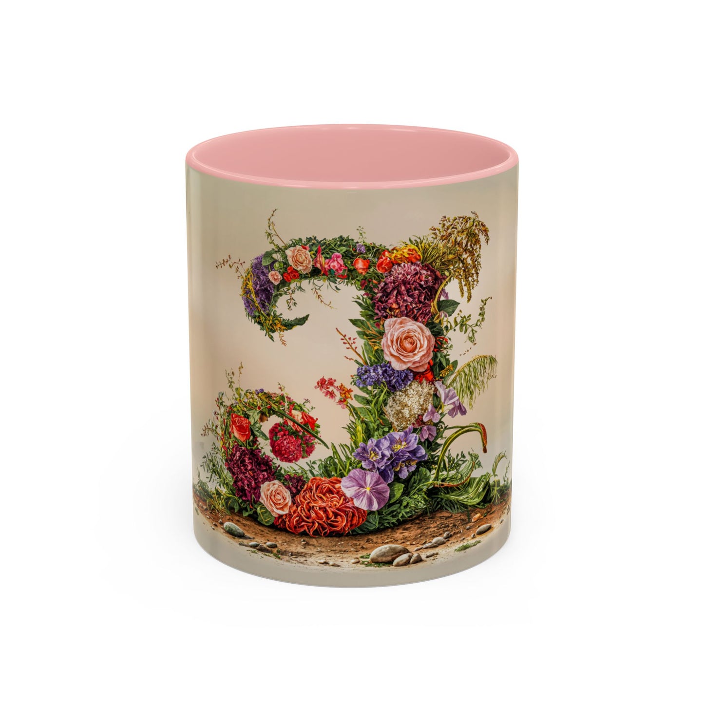 Mug with floral design and pink interior on a white background