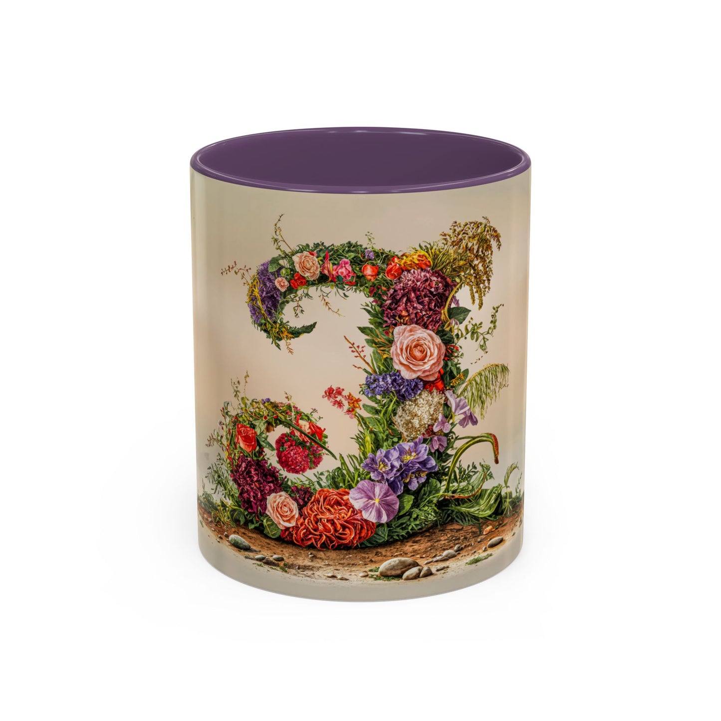 Decorative mug with floral design and purple interior on a white background