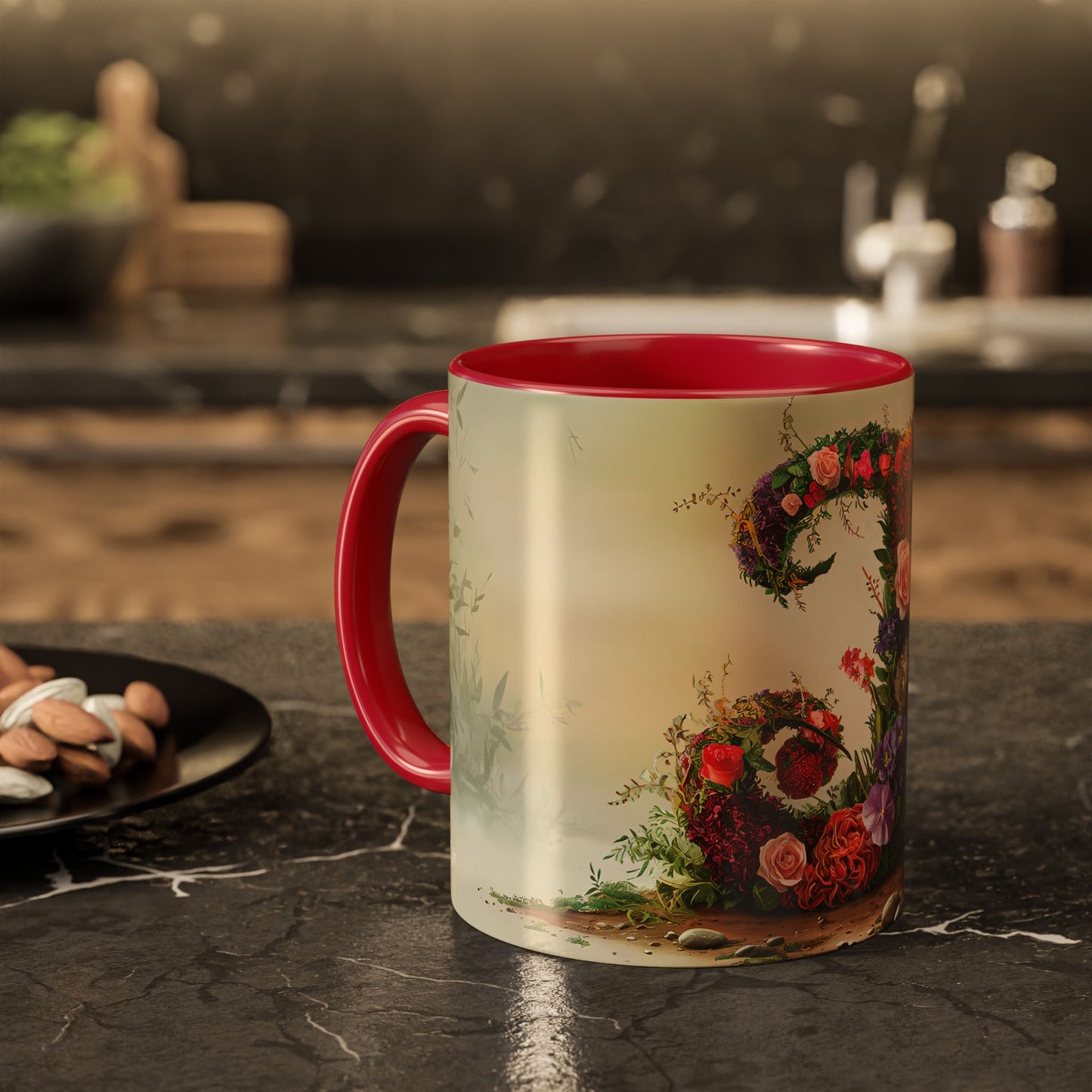 Mug with floral design and red interior on a kitchen counter