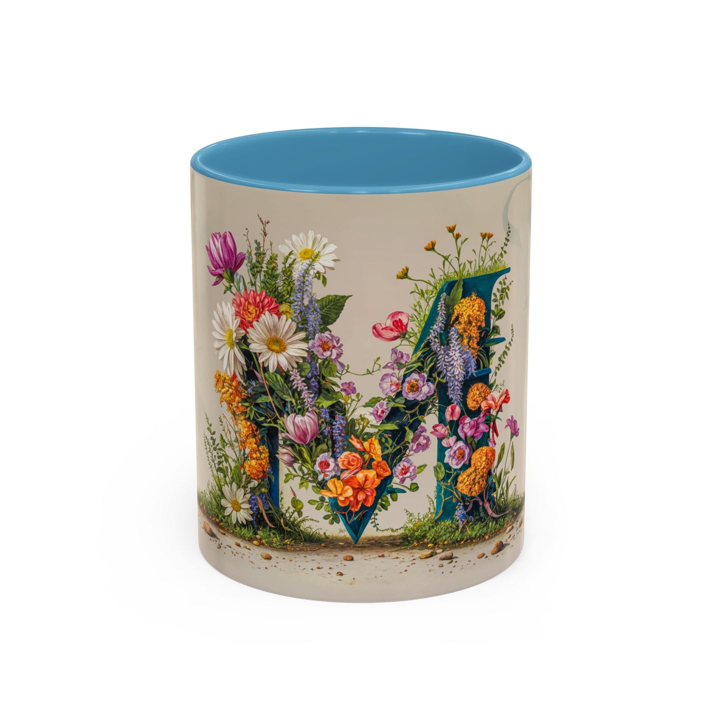 Mug with floral design and letter M on a white background