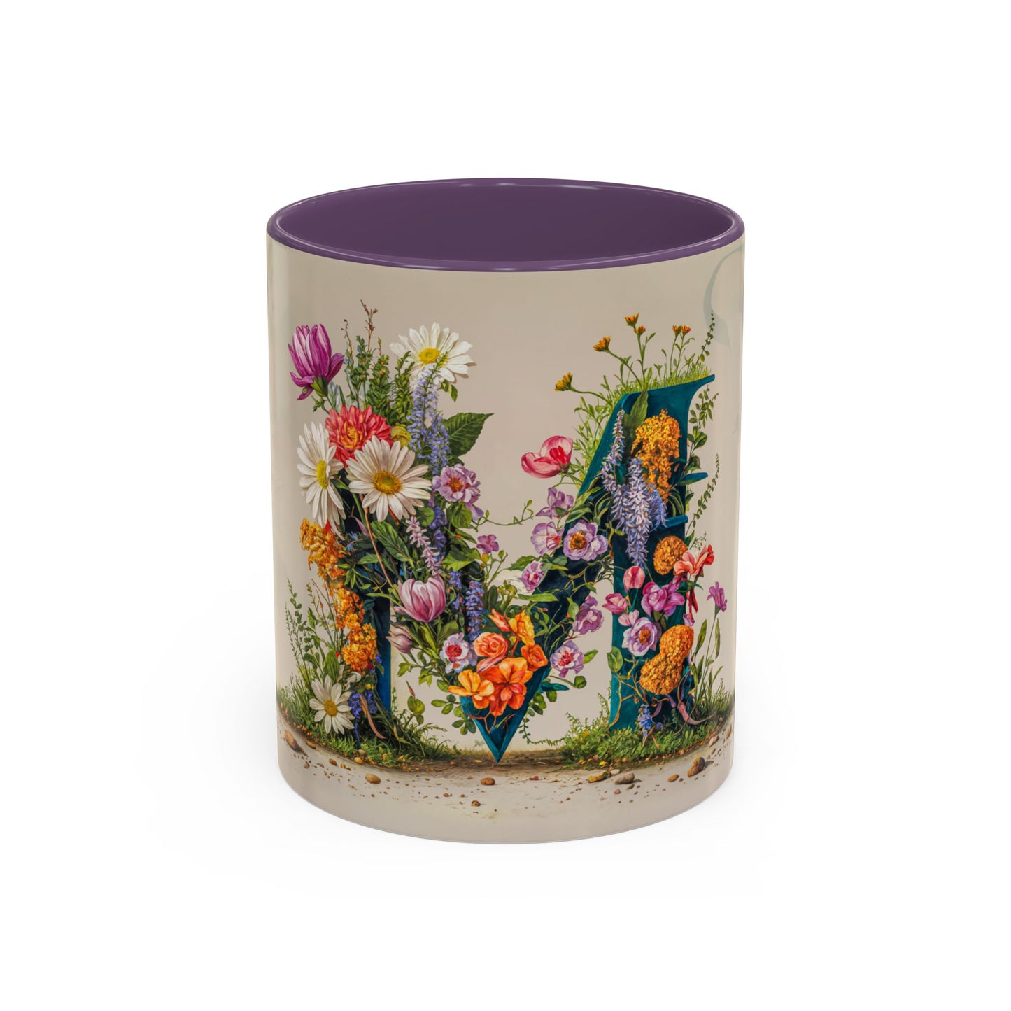 Mug with floral design and letter M on a white background