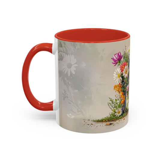 Mug with red interior and handle, featuring floral design on a white background