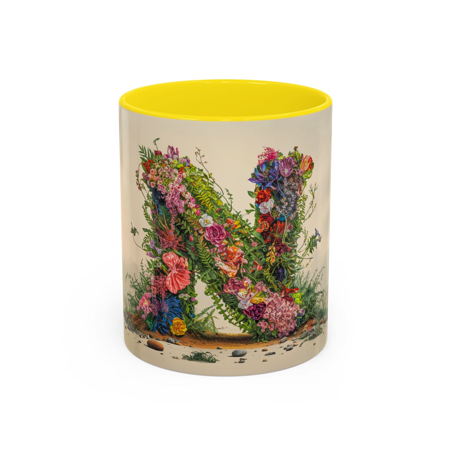 Mug with floral design and yellow interior on a white background