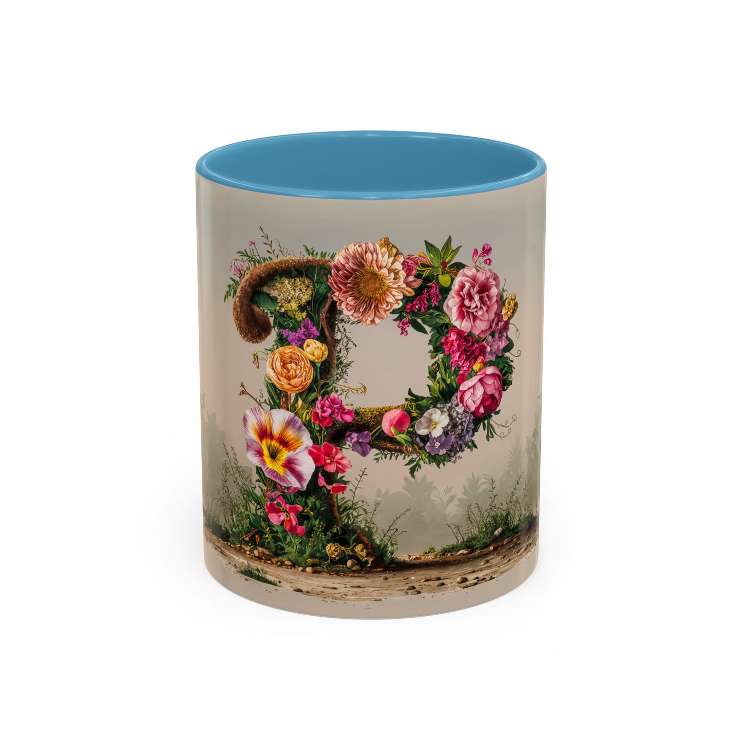 Mug with floral design and blue interior on a white background
