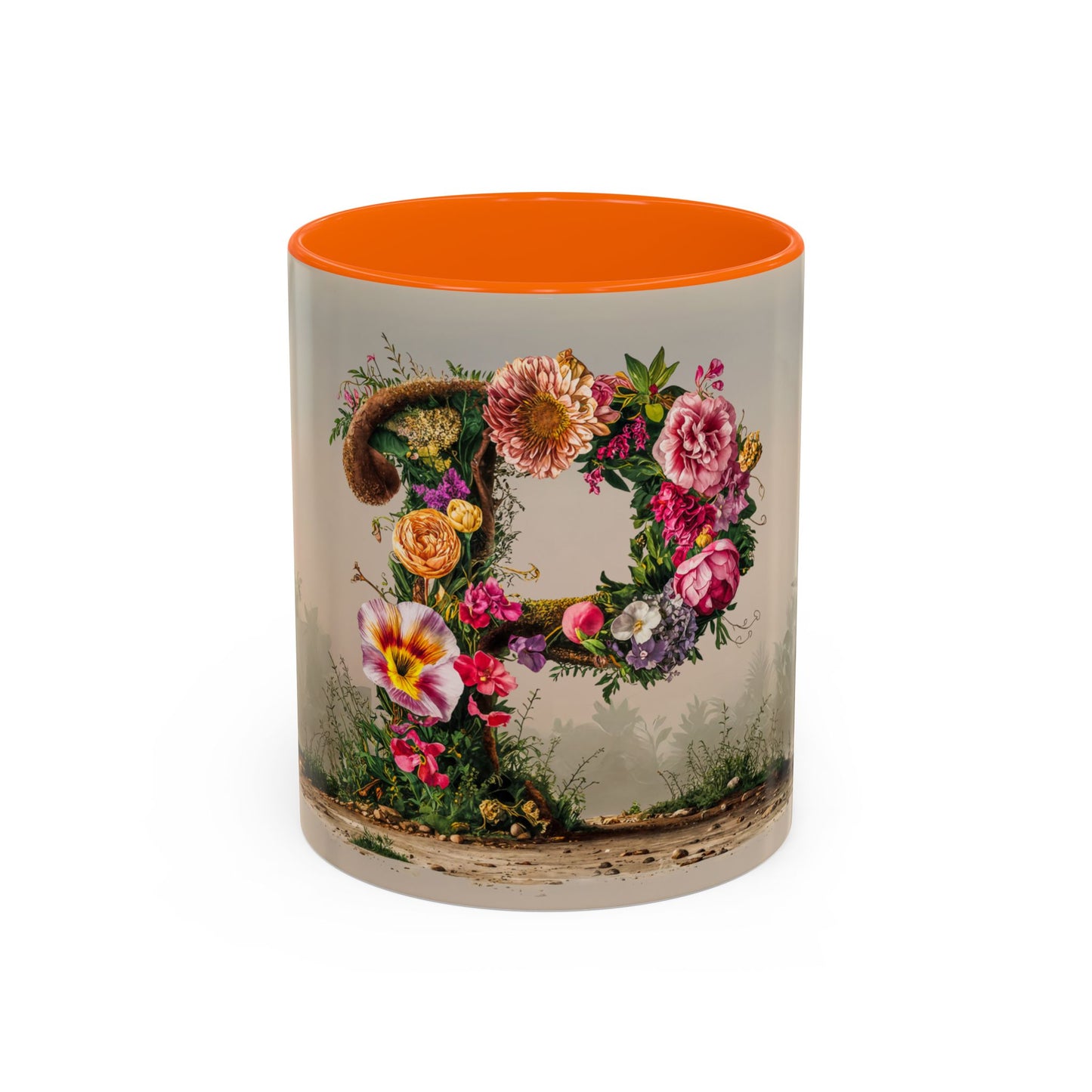 Mug with floral design and orange interior on a white background