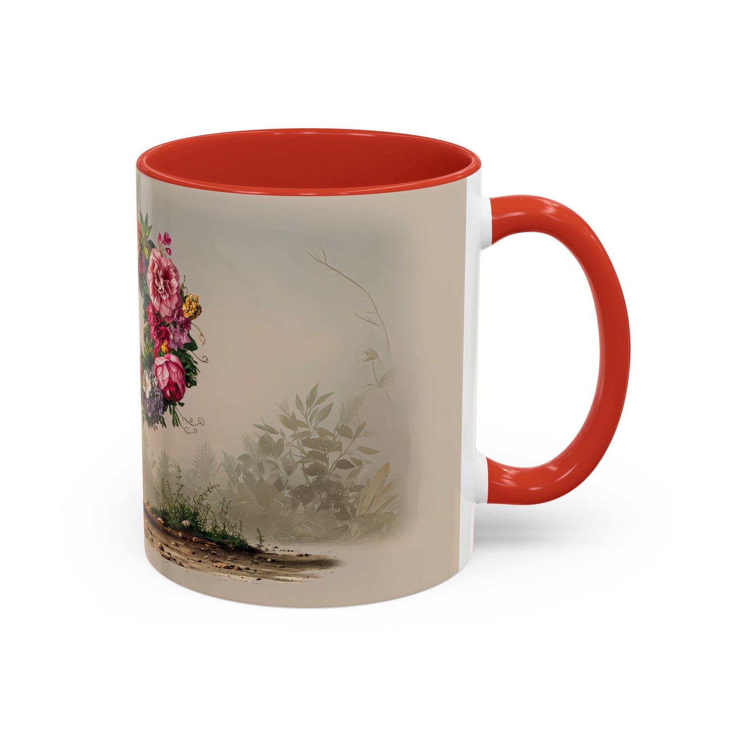 Mug with floral design and red interior and handle on a white background