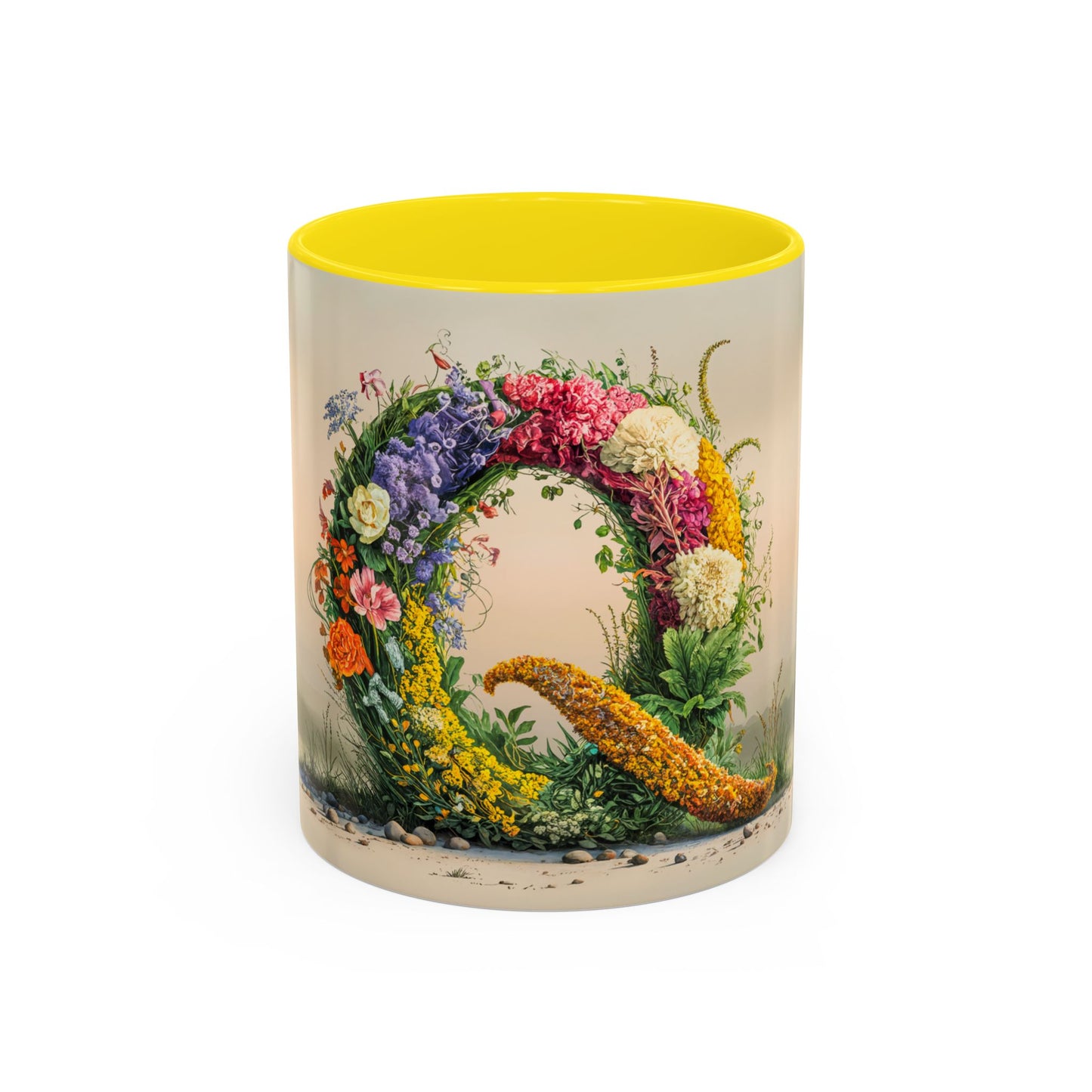 Ceramic mug with floral design and yellow interior on a white background