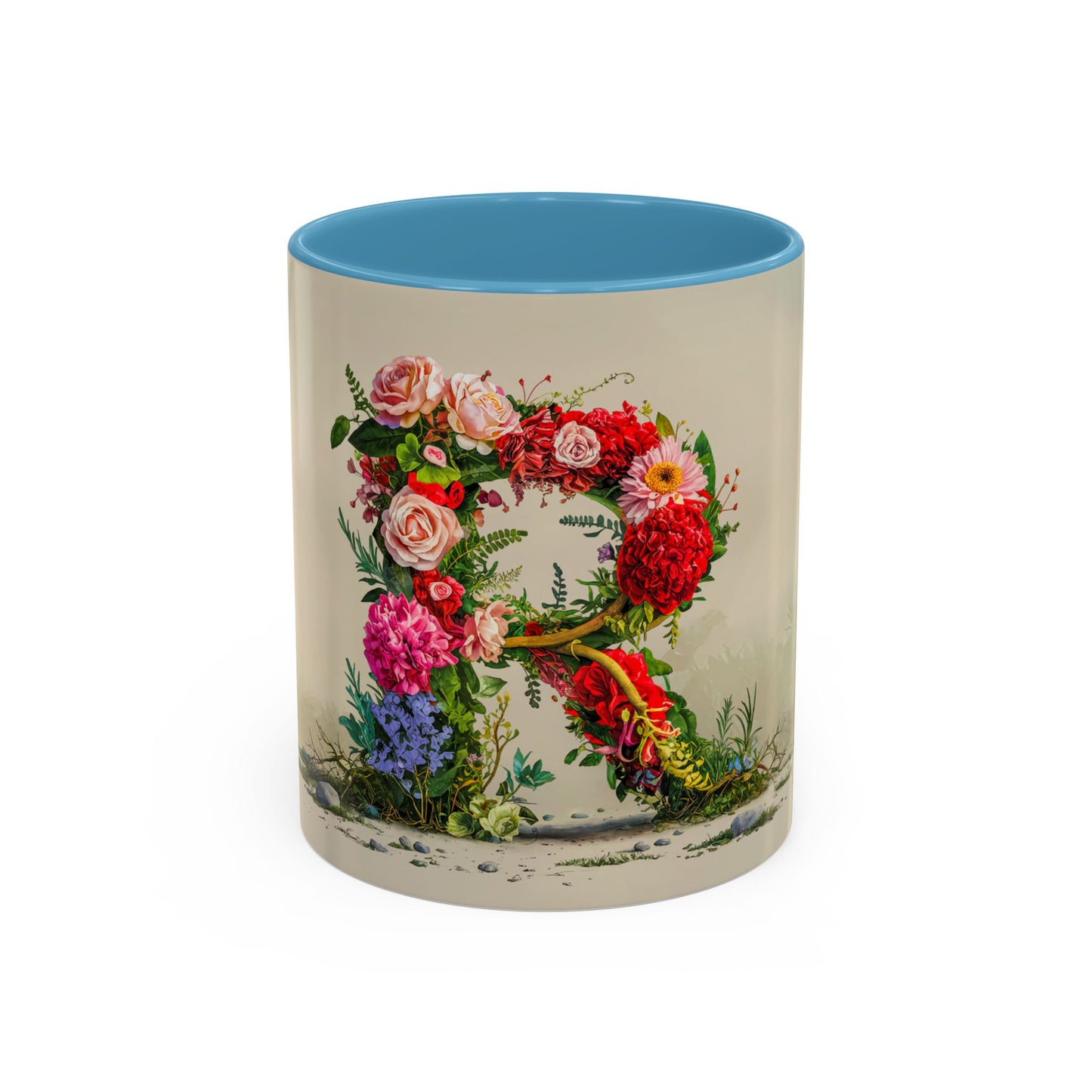 Mug with floral design and blue interior on a white background