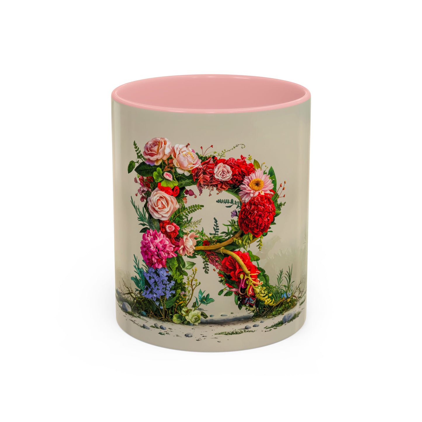 Mug with floral design and pink interior on a white background