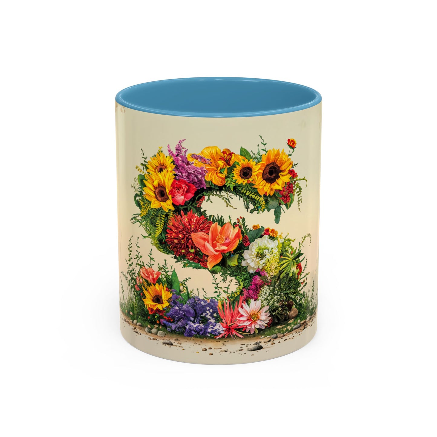 Mug with floral design and blue interior on a white background