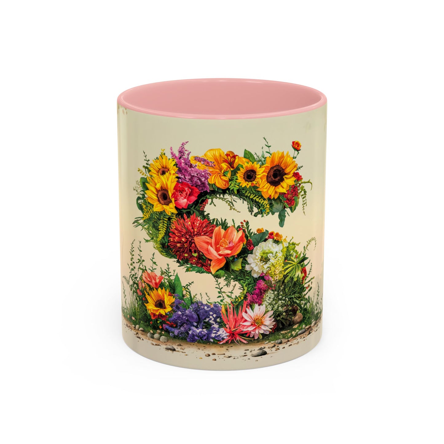 Mug with floral design and pink interior on a white background