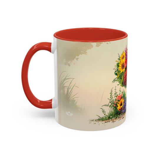 Mug with red interior and handle, featuring a floral design on the side.