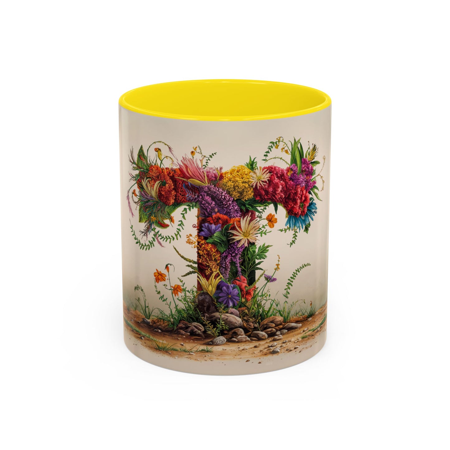 Mug with floral design and yellow interior on a white background