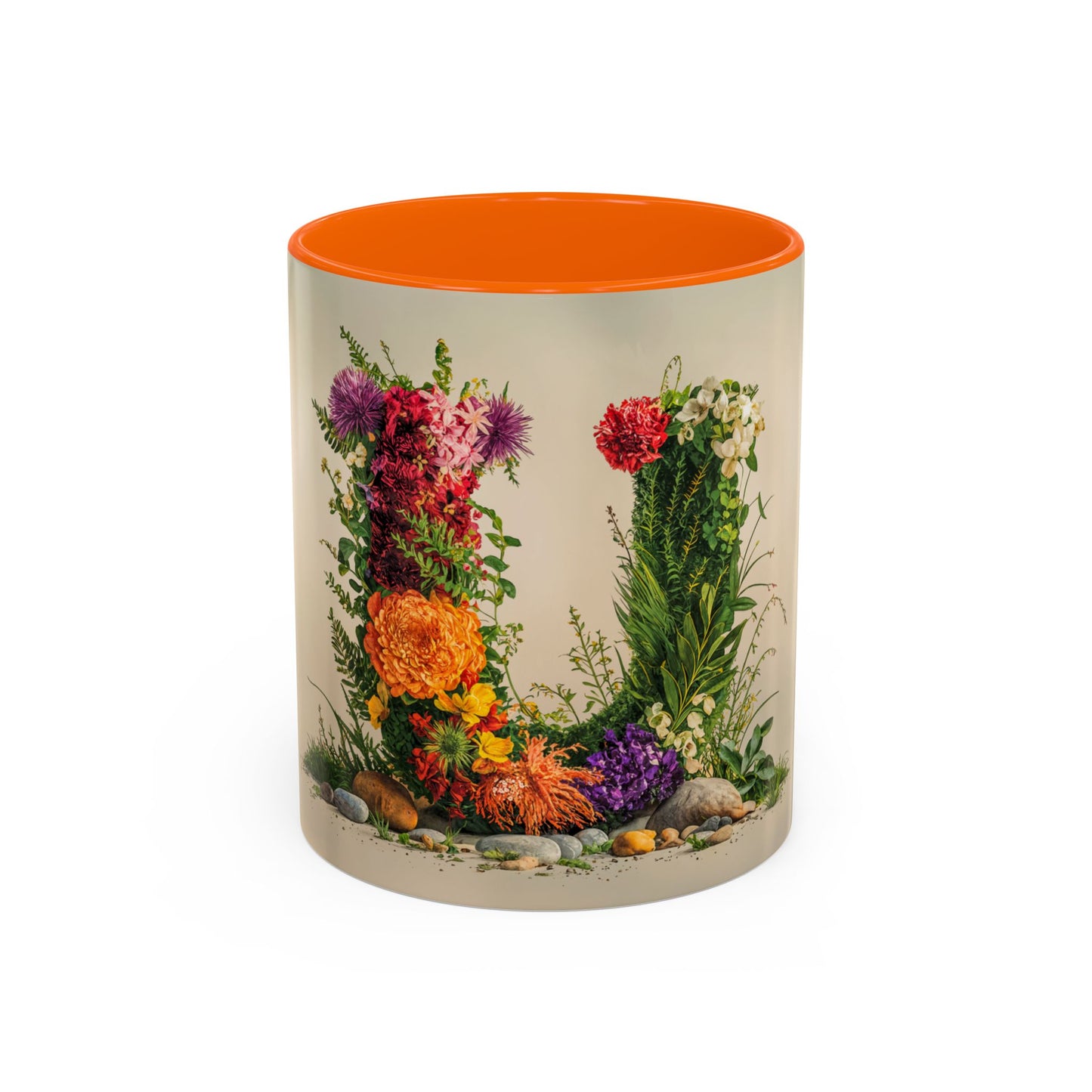 Mug with floral design and orange interior on a white background