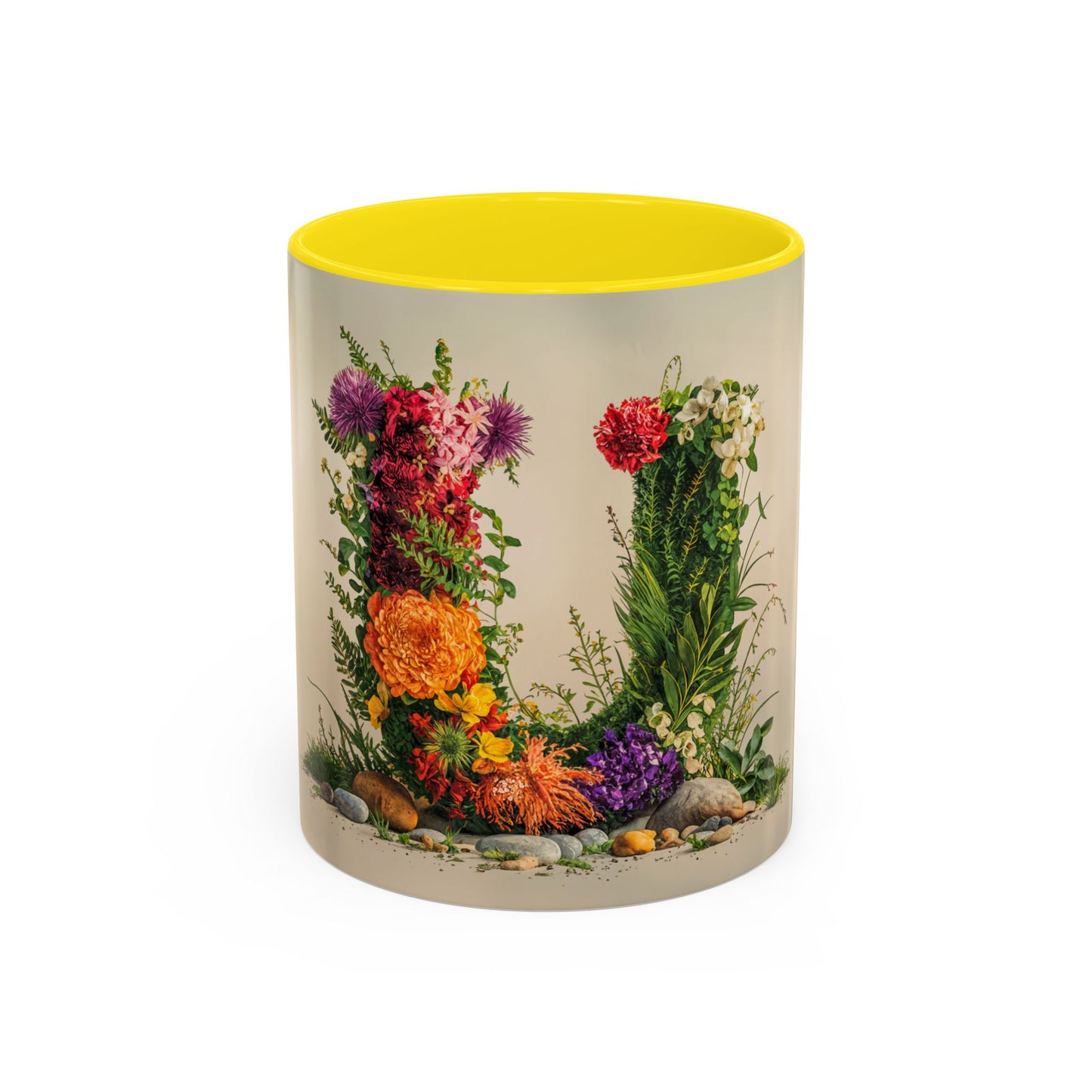 Mug with floral design and yellow interior on a white background