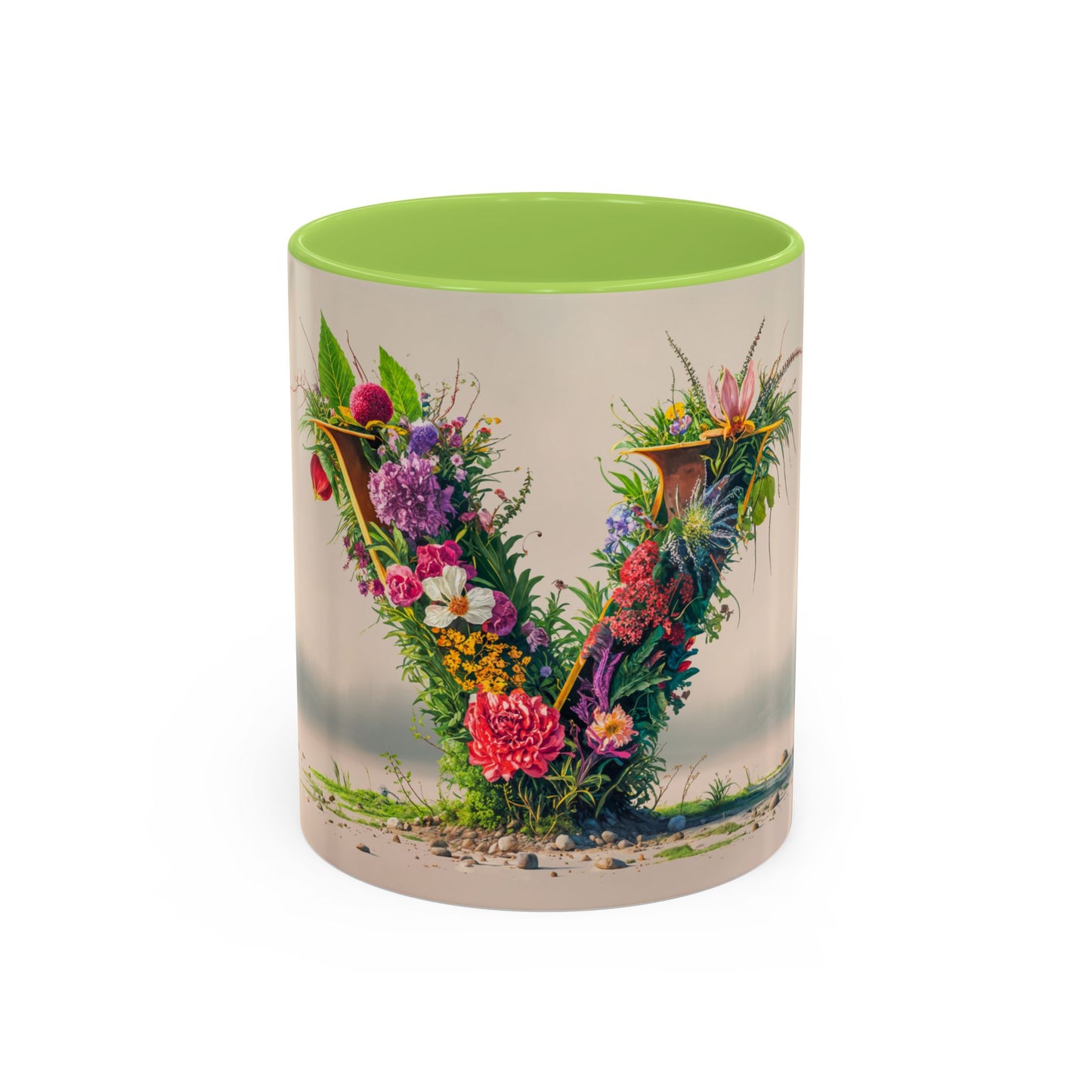 Mug with floral design and green interior on a white background