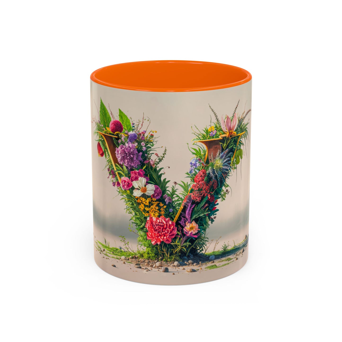 Mug with floral design and orange interior on a white background