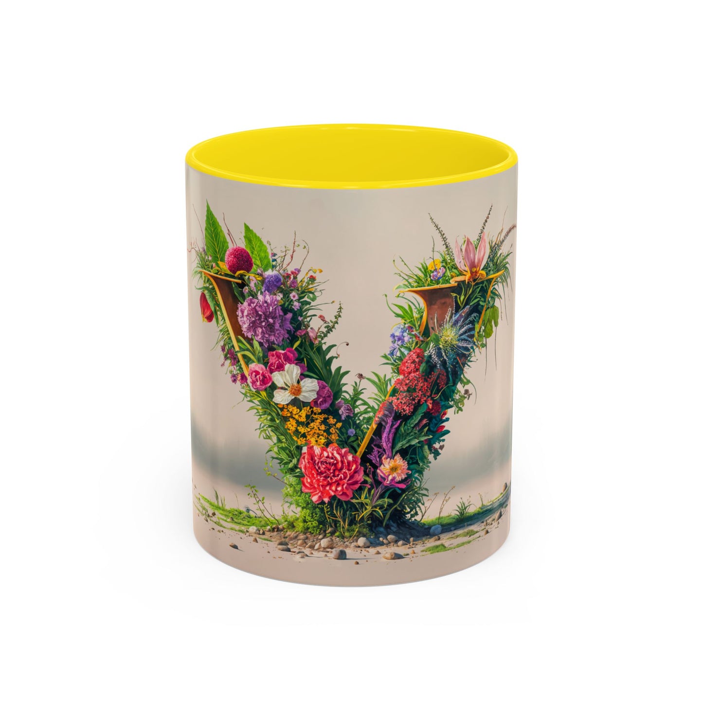 Mug with floral design and yellow interior on a white background