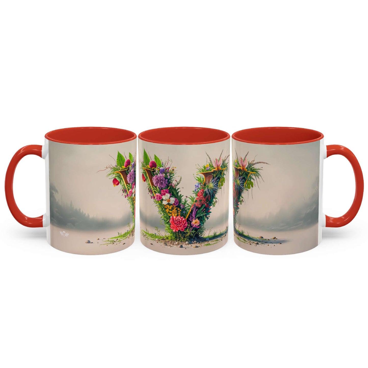Three mugs with floral letter 'V' design on a white background