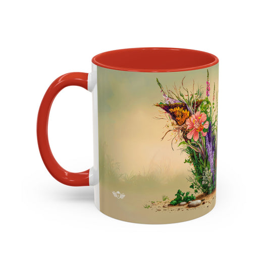 Mug with red interior and handle, featuring a floral design on the exterior.