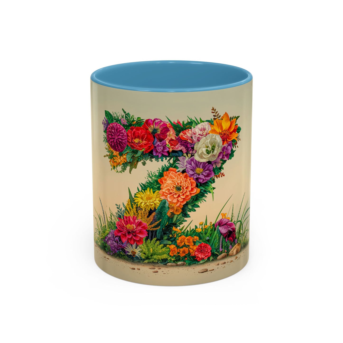 Mug with floral design and blue interior on a beige background