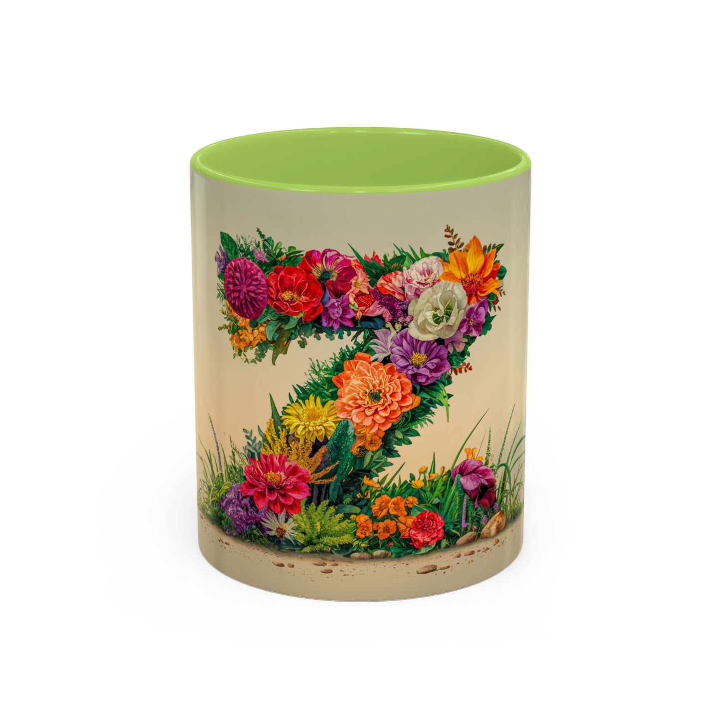 Mug with floral design and green interior on a white background