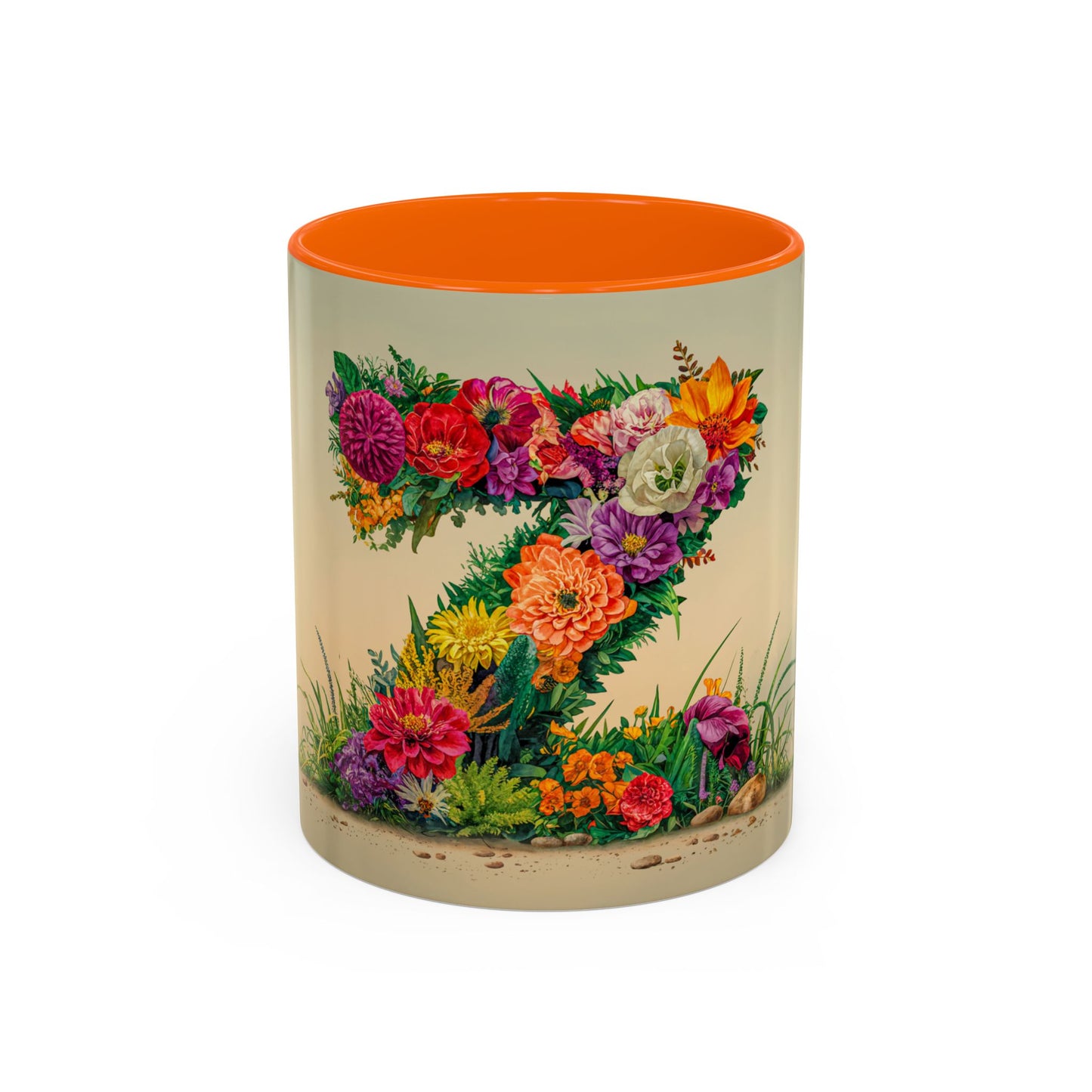Mug with floral design and orange interior on a beige background