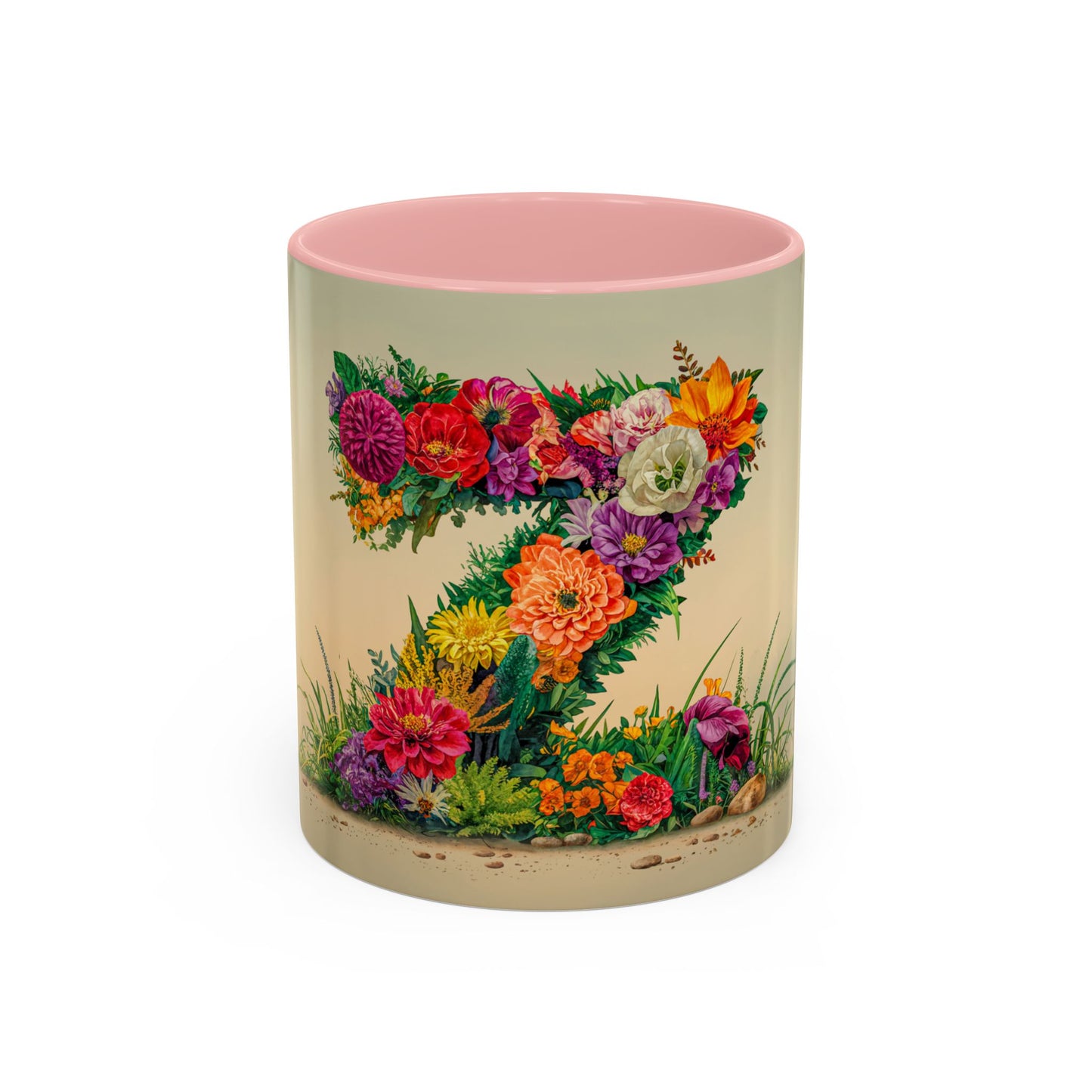 Mug with floral design and pink interior on a white background
