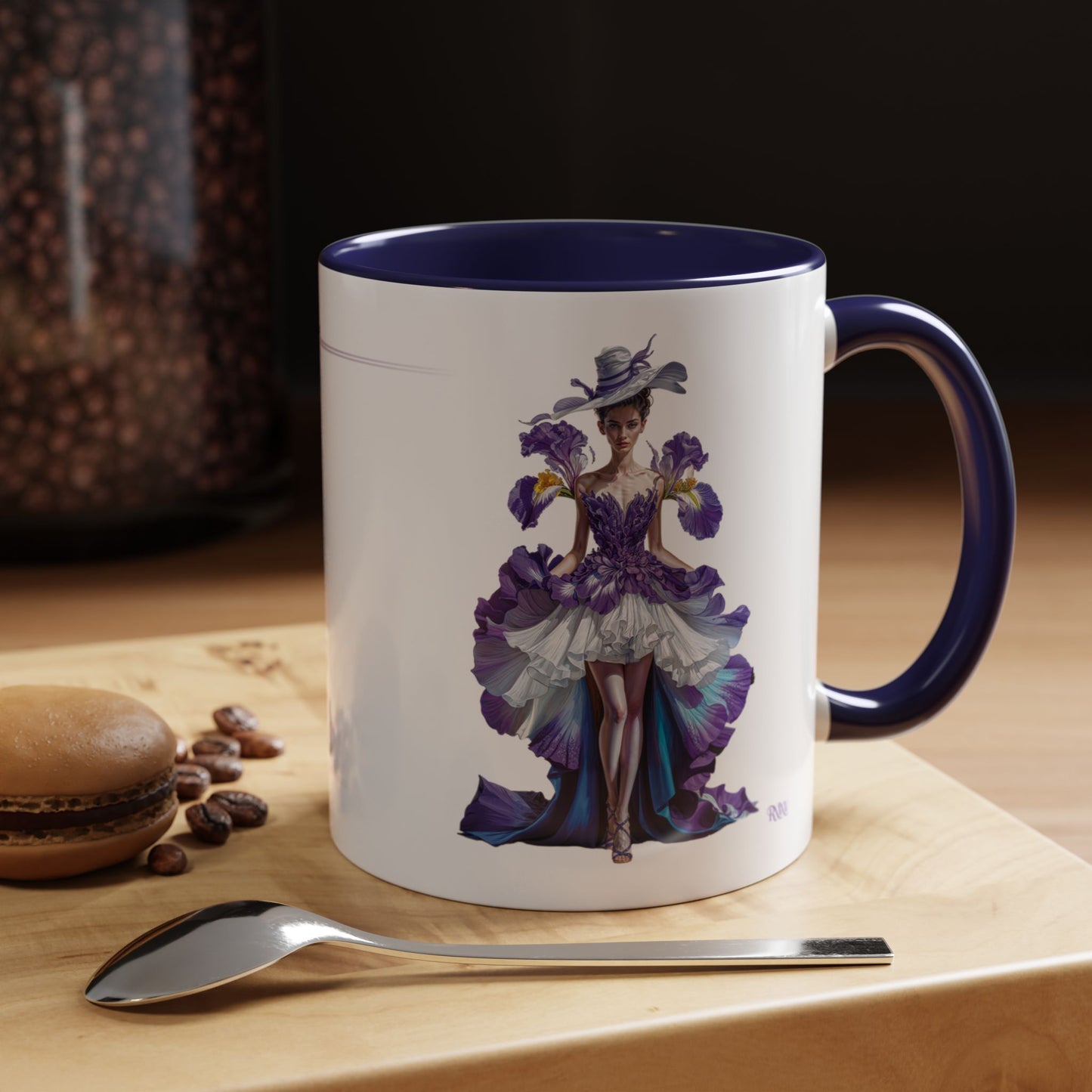 Mug with artistic design of a woman in a purple dress on a wooden surface with coffee beans and a spoon.