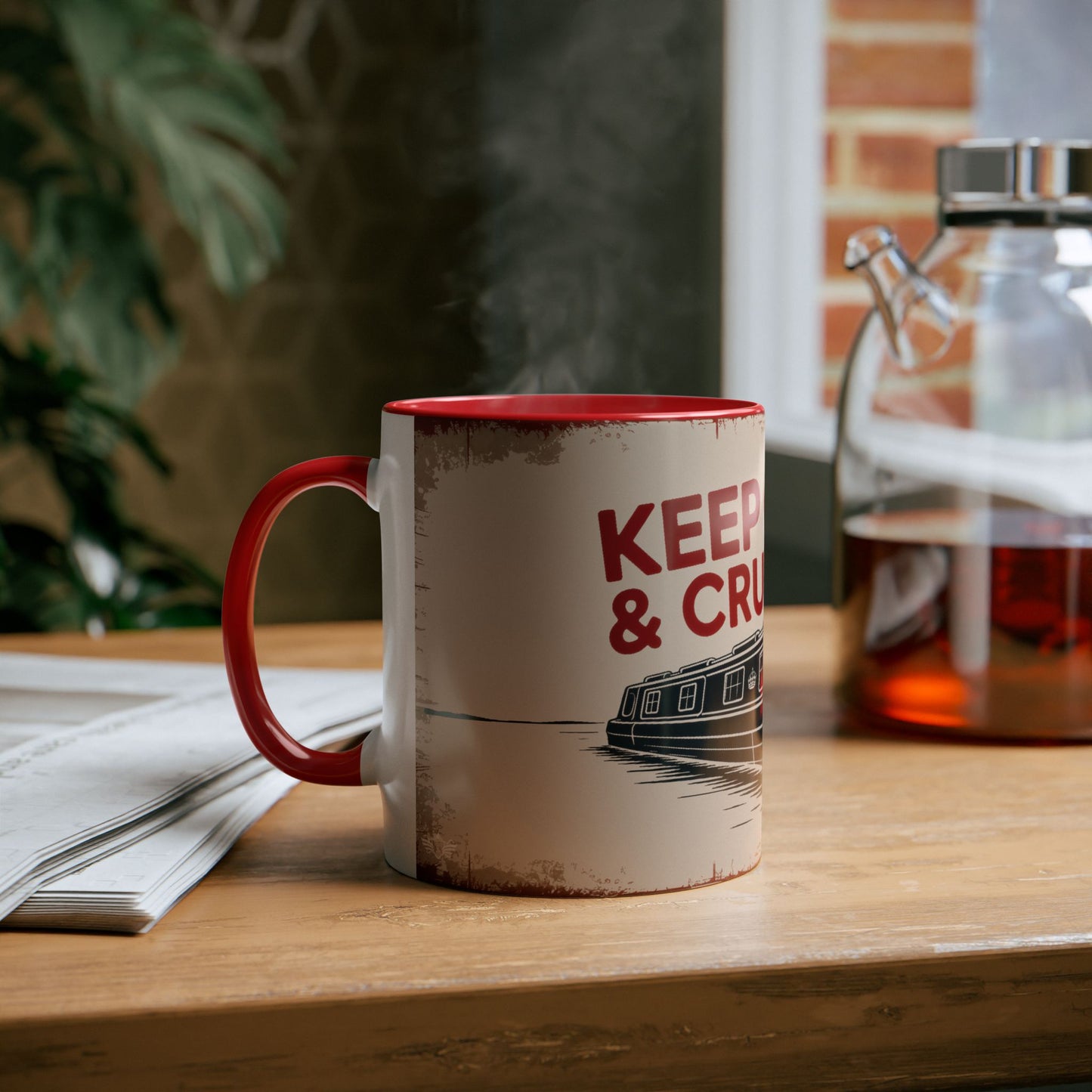Mug with "Keep Calm & Carry On" text on a wooden table with a blurred background